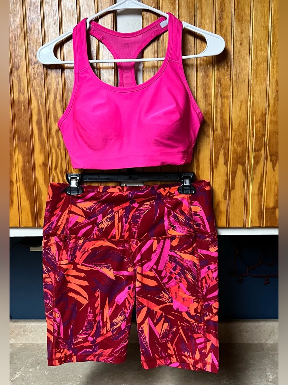 Bright Pink Sports Bra with Vibrant Printed Biker Shorts top is M shorts L